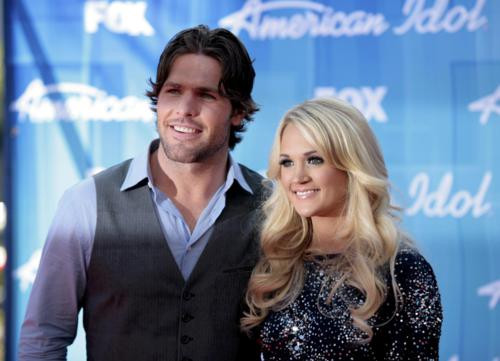 Cặp đôi Carrie Underwood và Mike Fisher sở hữu chiếc nhẫn kim cương vàng và trắng 12 cara trị giá 150.000 USD. Ảnh. Reuters. Cặp đôi Carrie Underwood và Mike Fisher sở hữu chiếc nhẫn kim cương vàng và trắng 12 cara trị giá 150.000 USD. Ảnh. Reuters.
