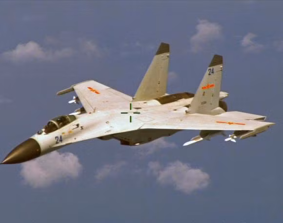 Chiến đấu cơ J-11 của Trung Quốc đã thực hiện hành vi áp sát máy bay tuần tra Mỹ 10 mét ở Biển Đông hôm 19/8. Hình minh họa. Chiến đấu cơ J-11 của Trung Quốc đã thực hiện hành vi áp sát máy bay tuần tra Mỹ 10 mét ở Biển Đông hôm 19/8. Hình minh họa.