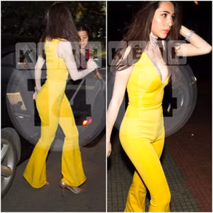 Gần đây, Thủy Tiên thường diện những bộ jumpsuit bó sát cơ thể, với quần ống loe, khoe đường cong nóng bỏng Nguồn: Zing