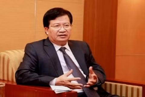 Bộ trưởng Bộ Xây dựng Trịnh Đình Dũng (Ảnh: vietnamnet.vn)
