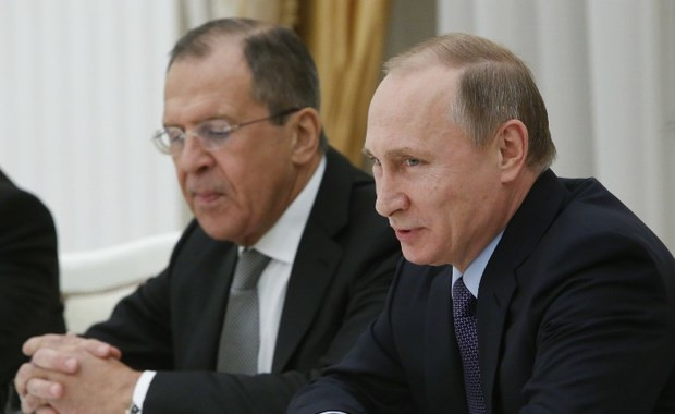 Tổng thống Nga Putin và Ngoại trưởng Lavrov trong buổi tiếp Ngoại trưởng Mỹ John Kerry. Ảnh: Kyivpost.