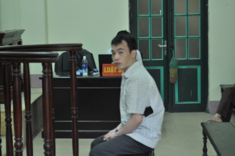 Bị cáo Long trong phiên xét xử ngày 21/9 Bị cáo Long trong phiên xét xử ngày 21/9