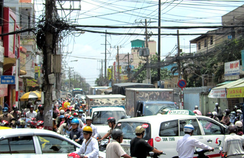 Các giao lộ trên các tuyến đường TP HCM sẽ được lắp đặt camera quan sát, tất cả thông tin về giao thông sẽ được chuyển về trung tâm điều khiển giao thông. Ảnh: Hữu Công. Các giao lộ trên các tuyến đường TP HCM sẽ được lắp đặt camera quan sát, tất cả thông tin về giao thông sẽ được chuyển về trung tâm điều khiển giao thông. Ảnh: Hữu Công.