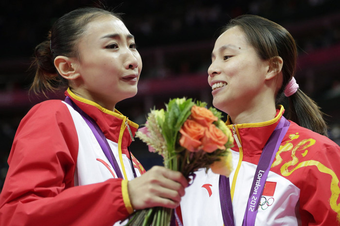 Các VĐV Trung Quốc đoạt HCV bạc môn nhảy trampoline.
