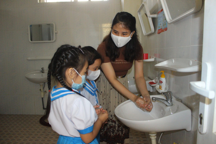 Đà Nẵng phấn đấu duy trì cột mốc 100% học sinh, sinh viên trên địa bàn tham gia bảo hiểm y tế. Ảnh: AN