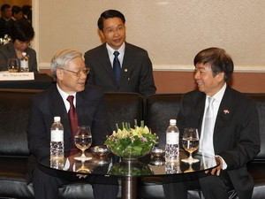 Tổng Bí thư Nguyễn Phú Trọng hội kiến với Chủ tịch Đảng Hành động Nhân dân Singapore Kho Bun Oan. (Ảnh: Trí Dũng/TTXVN).