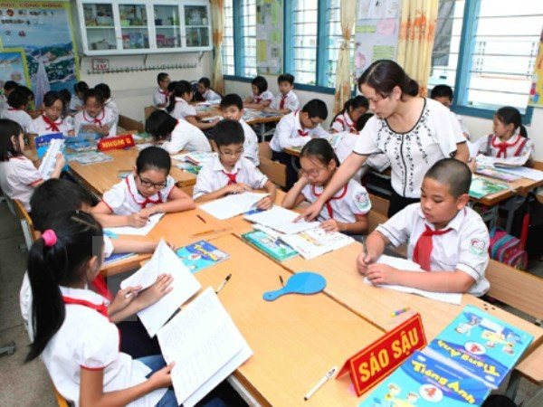 Đối tượng được miễn, giảm học phí (Ảnh: TTXVN) Đối tượng được miễn, giảm học phí (Ảnh: TTXVN)