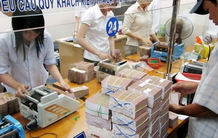 Ngân hàng nhà nước sẽ siết chặt thu phí giao dịch tiền mặt... Ảnh minh họa. Ngân hàng nhà nước sẽ siết chặt thu phí giao dịch tiền mặt... Ảnh minh họa.