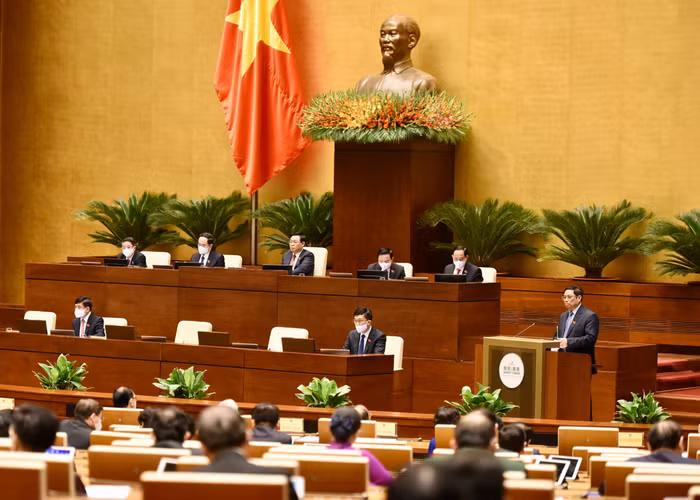 Thủ tướng Phạm Minh Chính trình bày báo cáo trước Quốc hội vào sáng 20/10 - Ảnh: VGP/Nhật Bắc