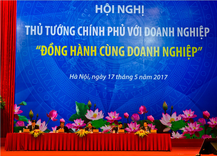 Thành viên Chính phủ điều hành Hội nghị Thủ tướng Chính phủ với doanh nghiệp năm 2017 - ảnh: Hoàng Lực.