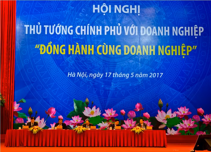 Thành viên Chính phủ điều hành Hội nghị Thủ tướng Chính phủ với doanh nghiệp năm 2017 - ảnh: Hoàng Lực.