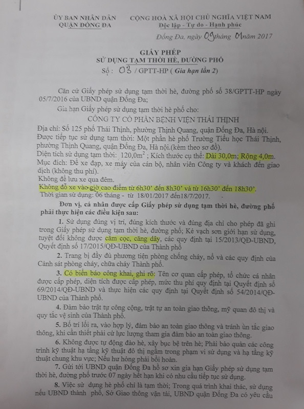 Giấy phép sử dụng tạm thời hè, đường phố do UBND quận Đống Đa cấp cho Công ty cổ phần bệnh viện Thái Thịnh. Ảnh Trần Việt. Giấy phép sử dụng tạm thời hè, đường phố do UBND quận Đống Đa cấp cho Công ty cổ phần bệnh viện Thái Thịnh. Ảnh Trần Việt.