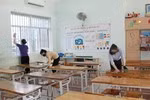 Các giáo viên tại tỉnh Quảng Trị tổ chức vệ sinh trường lớp để phòng chống dịch bệnh nCoV khi học sinh nghỉ học - (nguồn Báo Giáo dục và Thời đại).