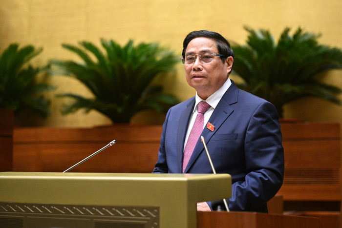 Thủ tướng Chính phủ Phạm Minh Chính báo cáo kết quả thực hiện kế hoạch phát triển kinh tế - xã hội năm 2024; dự kiến kế hoạch phát triển kinh tế - xã hội năm 2025. Ảnh: quochoi.vn. 211020240905-z5951531087814_0beb521fe8755c5beb25b437240421de.jpg