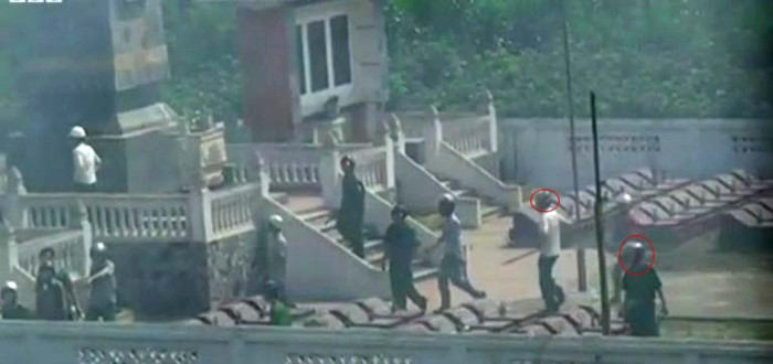 Những người tham gia hành hung 2 nhà báo mặc sắc phục công an, mang theo gậy và đội sẵn mũ bảo hiểm Những người tham gia hành hung 2 nhà báo mặc sắc phục công an, mang theo gậy và đội sẵn mũ bảo hiểm