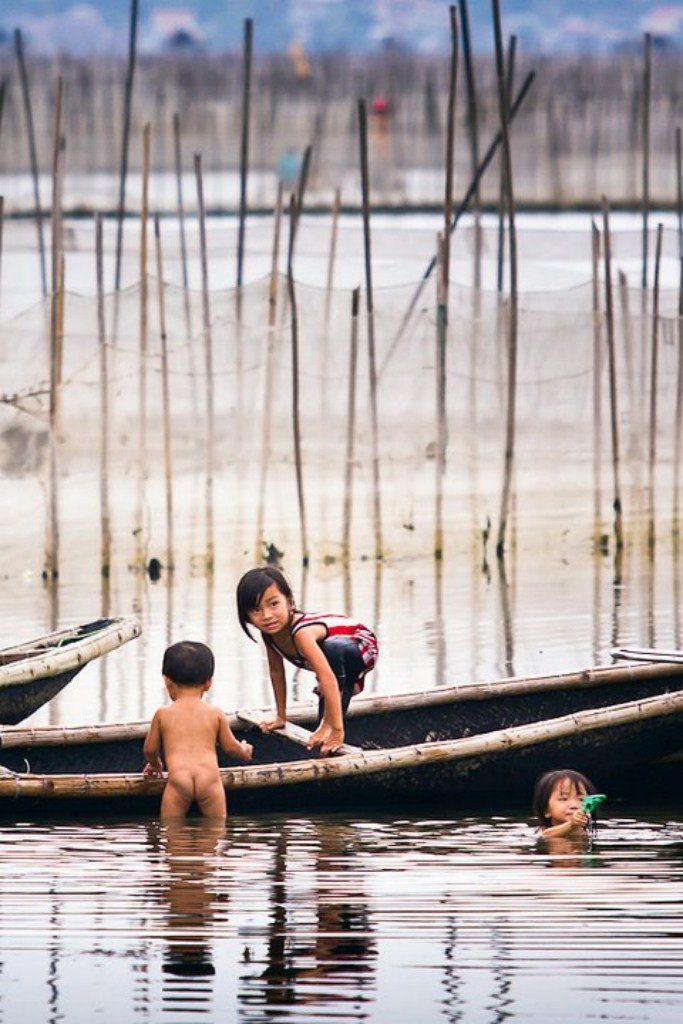 Những đứa trẻ làng chài vó Những đứa trẻ làng chài vó