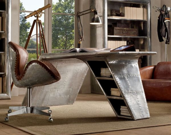 7. Bàn cánh máy bay hiện đại Mẫu thiết kế này của Restoration Hardware được lấy cảm hứng từ những chiếc máy bay chiến đấu chạy bằng hơi nước WWII. Hình dáng của chiếc bàn được bẻ cong giống hai cánh máy bay và có bề mặt nhôm được thiết bong loáng.