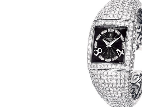 2. Piccolina Nằm trong bộ sưu tập của hãng De Grisogono, chiếc đồng hồ Piccolina được làm từ 18 carat vàng trắng, kim cương trắng và đá thạch anh. Mặt số màu đen được đính 20 viên kim cương trắng, vòng đeo tay làm từ vàng trắng được gắn tới 1.414 viên kim cương màu trắng 13,20 carat. Và đặc biệt, chiếc đồng hồ này có khả năng chịu nước lên đến 30 mét. 2. Piccolina Nằm trong bộ sưu tập của hãng De Grisogono, chiếc đồng hồ Piccolina được làm từ 18 carat vàng trắng, kim cương trắng và đá thạch anh. Mặt số màu đen được đính 20 viên kim cương trắng, vòng đeo tay làm từ vàng trắng được gắn tới 1.414 viên kim cương màu trắng 13,20 carat. Và đặc biệt, chiếc đồng hồ này có khả năng chịu nước lên đến 30 mét.