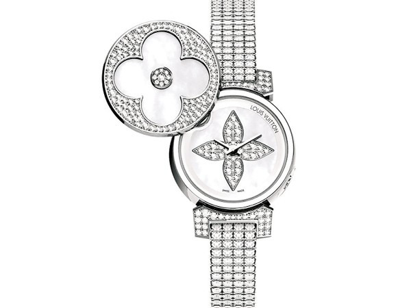 6. Tambour Bijou Secret Là một phiên bản giới hạn của hãng thời trang danh tiếng Louis Vuitton, chiếc đồng hồ được lấy cảm hứng từ sự tinh tế của trang sức. Nó được làm từ vàng trắng, ngọc trai, kim cương và có hai mặt hoa được lồng với nhau. Ngoài sự cao cấp, nó còn có khả năng chịu nước lên đến 30 mét. Bí ẩn, thanh lịch và sang trọng, chiếc đồng hồ này sẽ tô điểm cho cổ tay của bạn trong các bữa tiệc hay trong công việc hàng ngày. 6. Tambour Bijou Secret Là một phiên bản giới hạn của hãng thời trang danh tiếng Louis Vuitton, chiếc đồng hồ được lấy cảm hứng từ sự tinh tế của trang sức. Nó được làm từ vàng trắng, ngọc trai, kim cương và có hai mặt hoa được lồng với nhau. Ngoài sự cao cấp, nó còn có khả năng chịu nước lên đến 30 mét. Bí ẩn, thanh lịch và sang trọng, chiếc đồng hồ này sẽ tô điểm cho cổ tay của bạn trong các bữa tiệc hay trong công việc hàng ngày.
