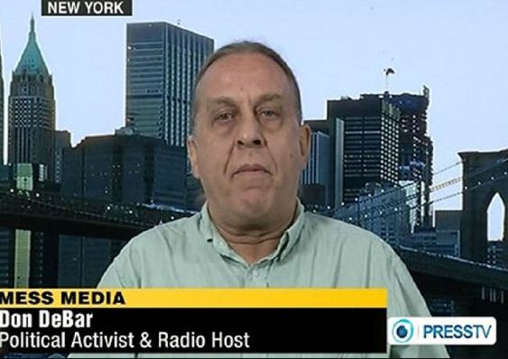 Nhà báo Don Debar, ảnh: Press TV. Nhà báo Don Debar, ảnh: Press TV.
