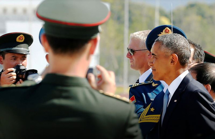 Ông Obama đến Trung Quốc dự họp G-20, ảnh: Jakarta Globe. Ông Obama đến Trung Quốc dự họp G-20, ảnh: Jakarta Globe.