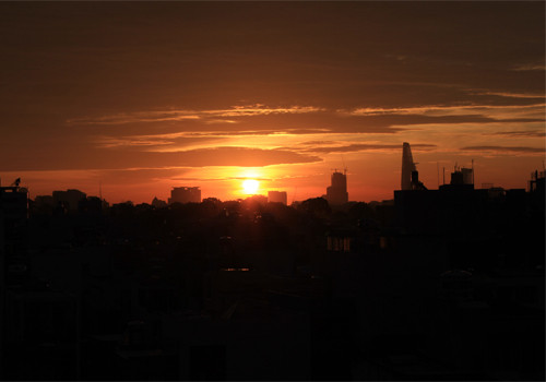 Bình minh trên thành phố Hồ Chí Minh. Ảnh: Nguyễn Văn Hải. Bình minh trên thành phố Hồ Chí Minh. Ảnh: Nguyễn Văn Hải.