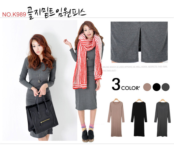 Váy liền dài qua gối sẽ đỡ đơn điệu hơn với một chiếc khăn len màu sắc sặc sỡ to bản.