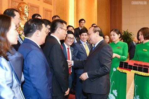 Thủ tướng ghi nhạn nỗ lực của các doanh nhân, doanh nghiệp. Ảnh: VGP Thủ tướng ghi nhạn nỗ lực của các doanh nhân, doanh nghiệp. Ảnh: VGP