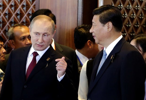 Rõ ràng bộ đôi Vladimir Putin và Tập Cận Bình đang bắt tay tăng cường hợp tác trong các vấn đề quốc tế và cần sự ủng hộ lẫn nhau. Rõ ràng bộ đôi Vladimir Putin và Tập Cận Bình đang bắt tay tăng cường hợp tác trong các vấn đề quốc tế và cần sự ủng hộ lẫn nhau.
