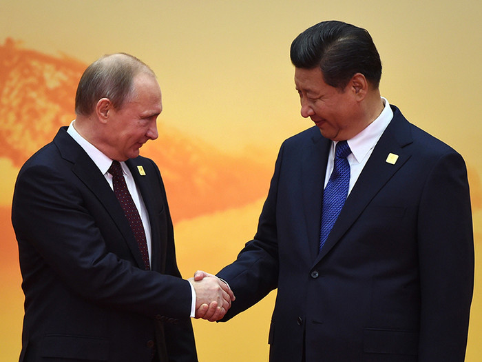 Tổng thống Nga Vladimir Putin và Chủ tịch Trung Quốc Tập Cận Bình. Tổng thống Nga Vladimir Putin và Chủ tịch Trung Quốc Tập Cận Bình.