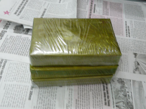 3 bánh heroine bị bắt quả tang khi phá đường dây buôn ma tuý từ Sơn La về Hải Phòng. Ảnh: Người Lao Động.