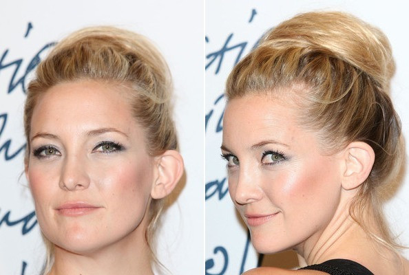 Kate Hudson tự tin và kiêu hãnh với mái tóc búi cao đỉnh đầu.