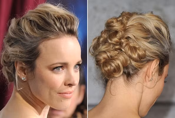 Rachel McAdam thật xinh đẹp và nữ tính với kiểu tóc búi cuộn về phía sau này.