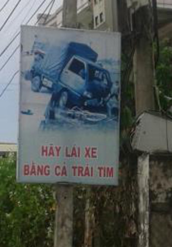 "Hãy lái xe bằng cả trái tim", ảnh chụp tại Duy Xuyên, Quảng Nam. Ảnh: Võ Minh Tuyên. "Hãy lái xe bằng cả trái tim", ảnh chụp tại Duy Xuyên, Quảng Nam. Ảnh: Võ Minh Tuyên.