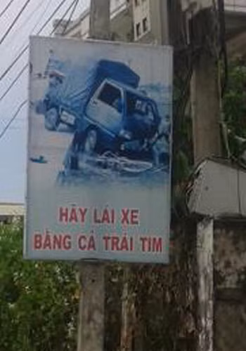 "Hãy lái xe bằng cả trái tim", ảnh chụp tại Duy Xuyên, Quảng Nam. Ảnh: Võ Minh Tuyên. "Hãy lái xe bằng cả trái tim", ảnh chụp tại Duy Xuyên, Quảng Nam. Ảnh: Võ Minh Tuyên.