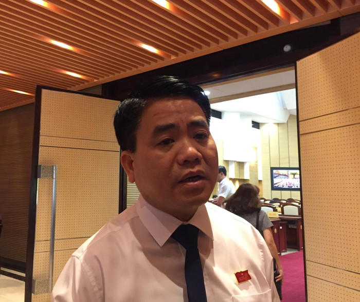 Chủ tịch Ủy ban Nhân dân Thành phố Hà Nội Nguyễn Đức Chung trao đổi với báo chí. Ảnh: Minh Nguyễn Chủ tịch Ủy ban Nhân dân Thành phố Hà Nội Nguyễn Đức Chung trao đổi với báo chí. Ảnh: Minh Nguyễn