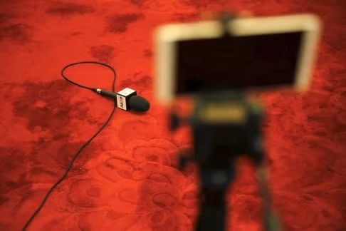 Nhiều phóng viên Trung Quốc và quốc tế bị bất ngờ trước quy định của ban tổ chức, hình: Reuters.