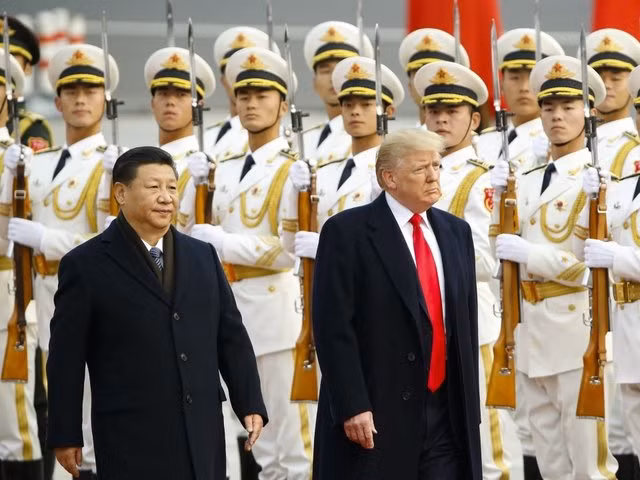 Tổng thống Mỹ Donald Trump và Chủ tịch Trung Quốc Tập Cận Bình tại Bắc Kinh, ảnh: The Denver Channel.