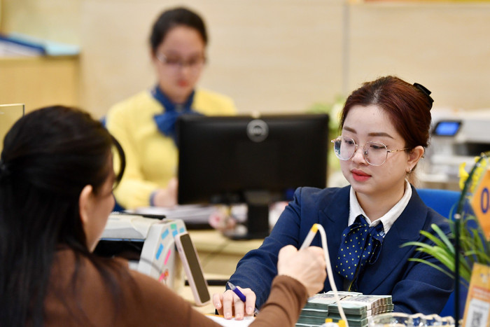 Ngành ngân hàng triển khai nhiều giải pháp hỗ trợ doanh nghiệp và người dân phát triển kinh tế. anh-minh-hoa-01.jpg