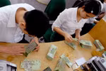 Tán thành mức thuế thu nhập cá nhân là 9 triệu đồng/tháng