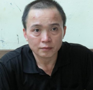 Nguyễn Thanh Sơn tại cơ quan điều tra (ảnh NLĐ) Nguyễn Thanh Sơn tại cơ quan điều tra (ảnh NLĐ)