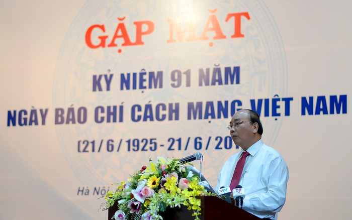 Thủ tướng Nguyễn Xuân Phúc trong buổi gặp mặt những người làm báo. Ảnh Xuân Trung