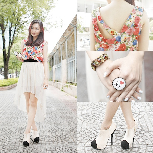 Với chiếc áo hoa, chân váy mullet nhẹ nhàng, DươngBBC hoàn toàn nữ tính, cuốn hút trên phố mùa thu.