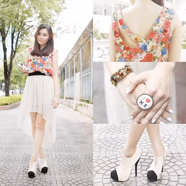 Với chiếc áo hoa, chân váy mullet nhẹ nhàng, DươngBBC hoàn toàn nữ tính, cuốn hút trên phố mùa thu.