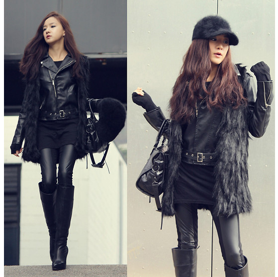 Một "cây" đen trên chất liệu da và lông trông cô ấy sành điệu như một ca sĩ vừa mới bước xuống từ sân khấu.