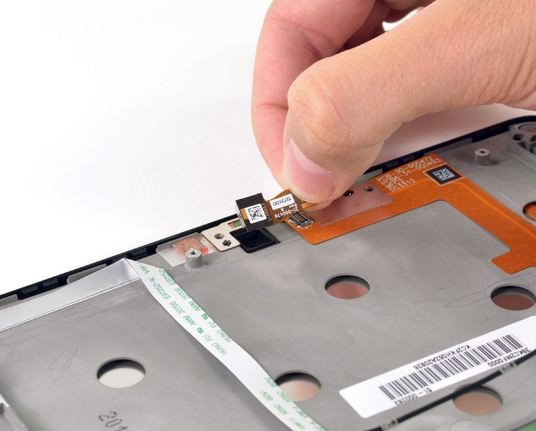 Tháo camera trước. Camera trước của máy có thể quay video HD.