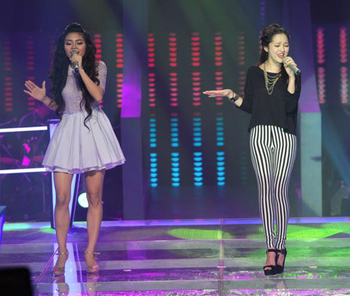 Thí sinh Bảo Anh (phải) đã bớt mỏng manh hơn từ khi vào đội Trần Lập.