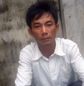 Đối tượng Nguyễn Văn Nhuần tại cơ quan điều tra. (Ảnh: Nguyễn Đình Lộc) Đối tượng Nguyễn Văn Nhuần tại cơ quan điều tra. (Ảnh: Nguyễn Đình Lộc)