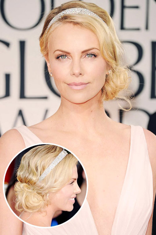 Kiểu tóc búi lệch một bên khiến Charlize Theron dịu dàng và cuốn hút vô cùng. Kiểu tóc búi lệch một bên khiến Charlize Theron dịu dàng và cuốn hút vô cùng.