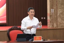 Trưởng ban Tổ chức Thành ủy Hà Minh Hải trao đổi tại buổi họp báo